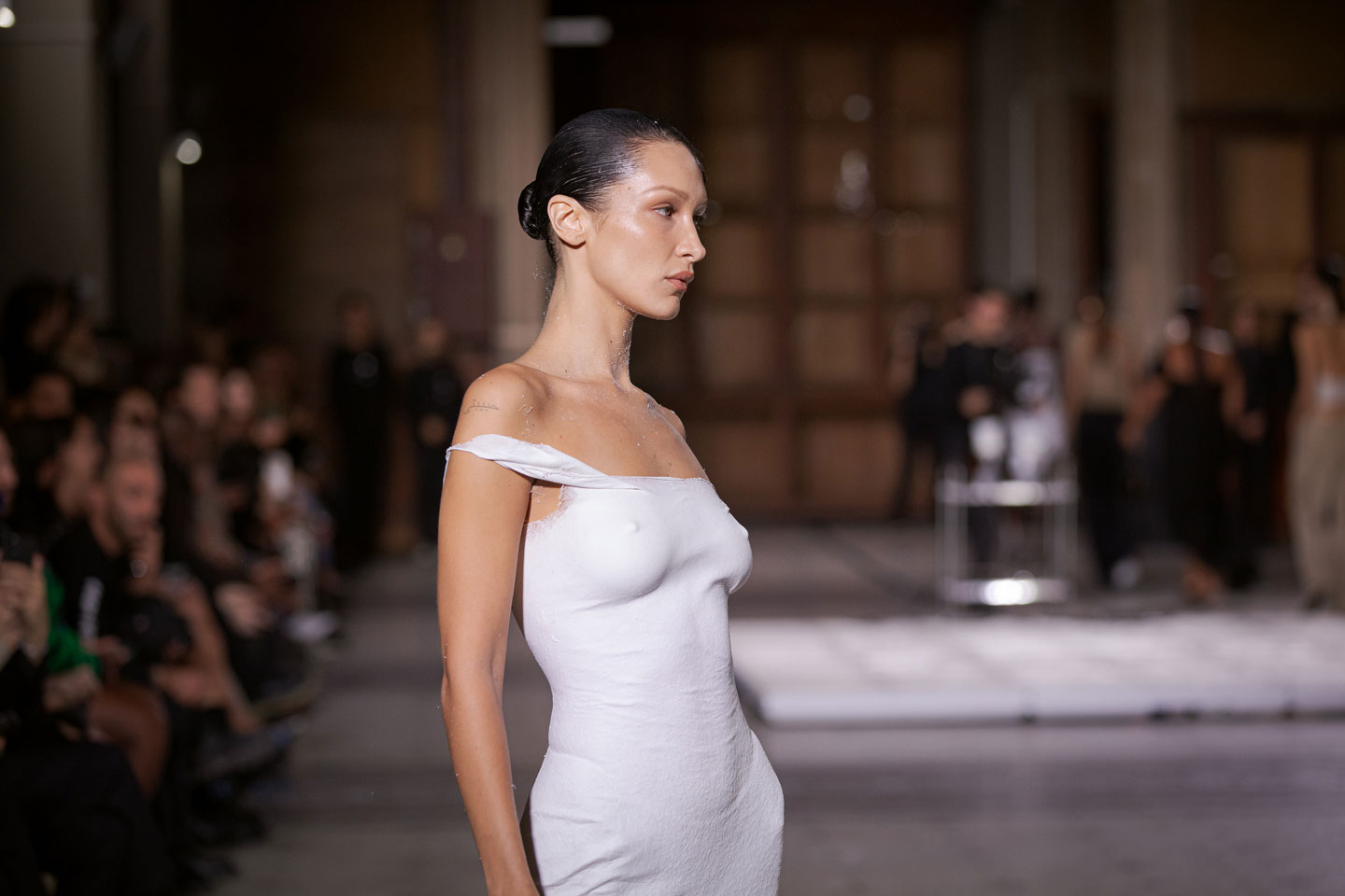 Model has dress sprayed onto body on Coperni runway