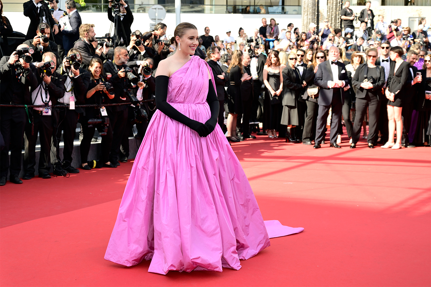 Greta Gerwig wore LOOK 58 from the Balenciaga 52nd Couture collection while attending the "L’Amour Ouf" red carpet at the 77th Cannes Film Festival, on May 23rd. Courtesy of Balenciaga